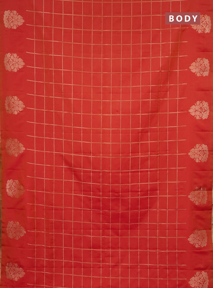 Semi soft silk saree dual shade of pinkish orange with allover zari woven checked pattern with zari woven butta border