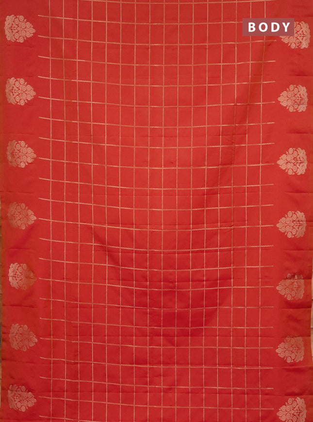 Semi soft silk saree dual shade of pinkish orange with allover zari woven checked pattern with zari woven butta border