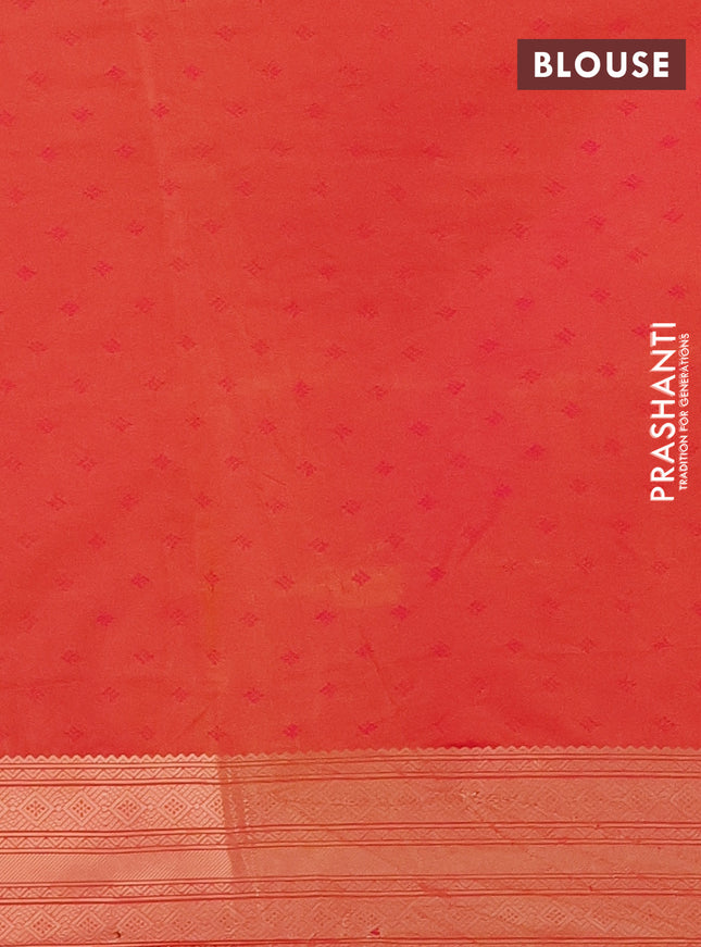 Semi soft silk saree dual shade of pinkish orange with allover zari woven checked pattern with zari woven butta border