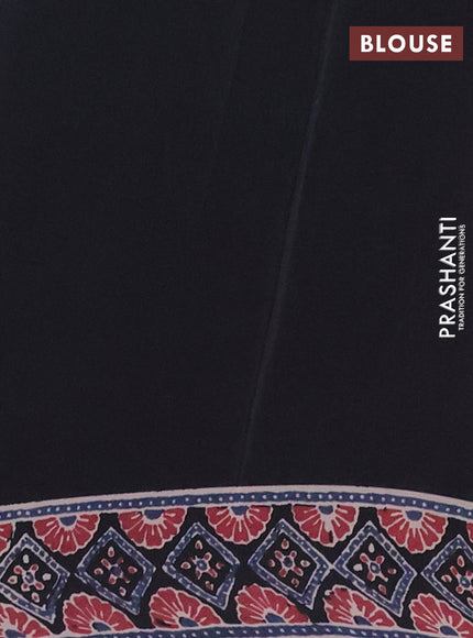 Semi crepe saree black with allover prints and printed border