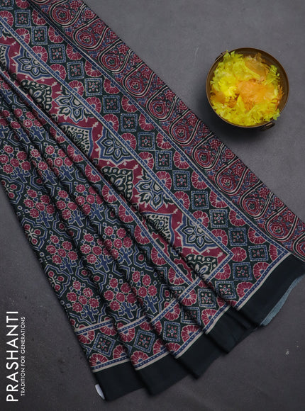 Semi crepe saree green with allover prints and printed border