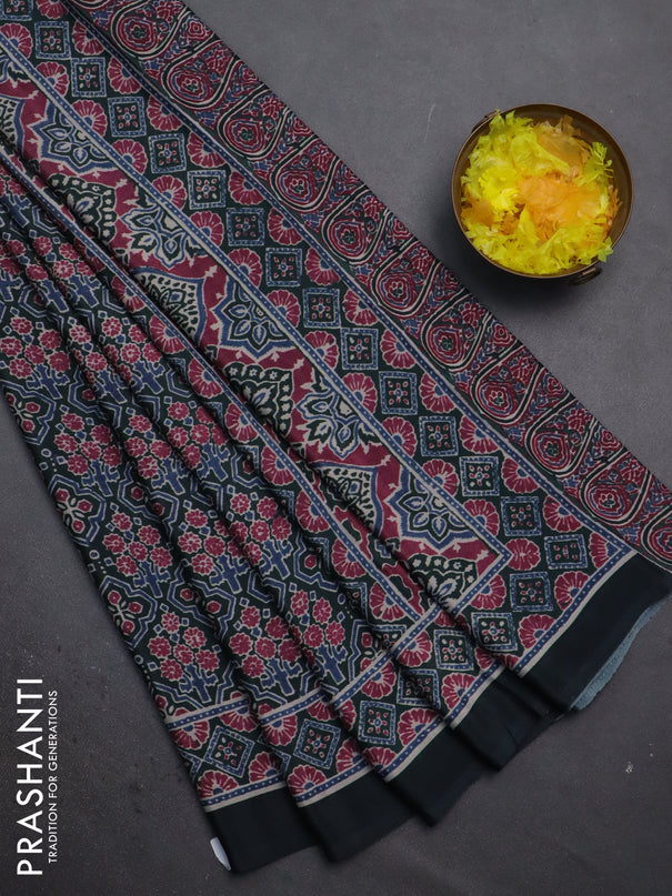 Semi crepe saree green with allover prints and printed border