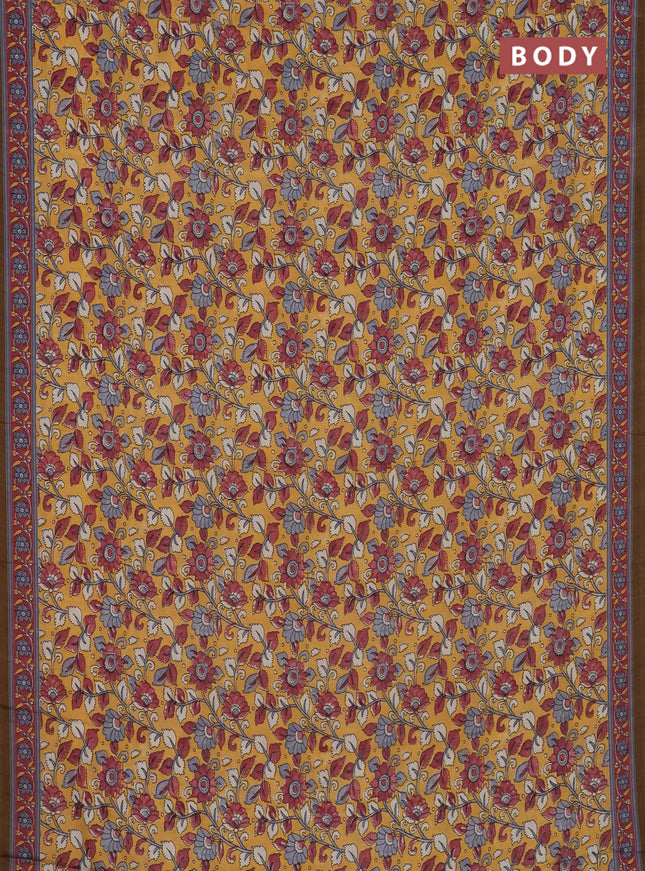 Semi crepe saree mustard yellow with allover kalamkari prints and printed border