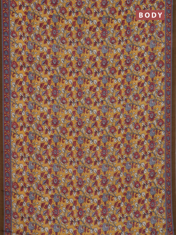 Semi crepe saree mustard yellow with allover kalamkari prints and printed border