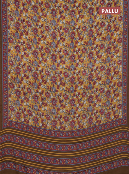 Semi crepe saree mustard yellow with allover kalamkari prints and printed border