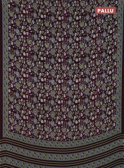 Semi crepe saree wine shade with allover kalamkari prints and printed border
