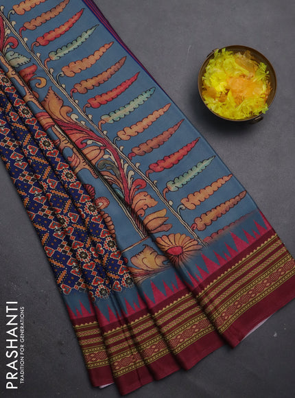 Semi crepe saree blue and maroon with allover ikat prints and printed border