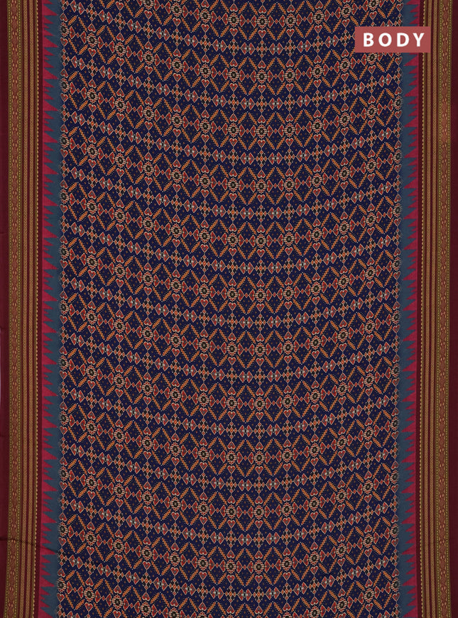 Semi crepe saree blue and maroon with allover ikat prints and printed border