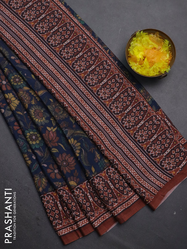 Semi crepe saree peacock blue and rust shade with allover kalamkari prints and printed border