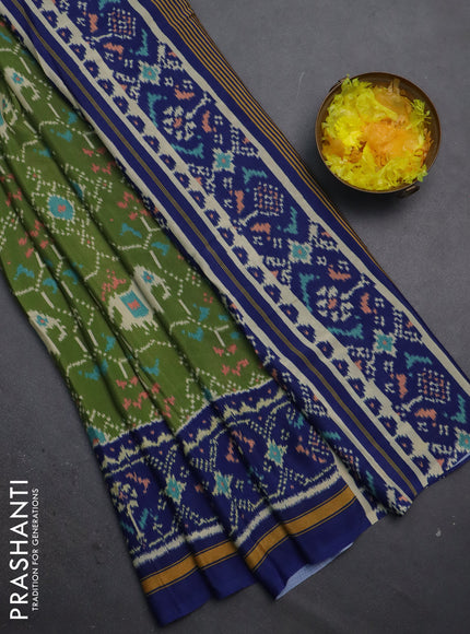 Semi crepe saree green and blue with allover ikat prints and printed border