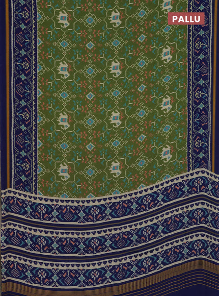 Semi crepe saree green and blue with allover ikat prints and printed border