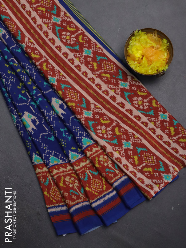 Semi crepe saree blue and maroon with allover ikat prints and printed border