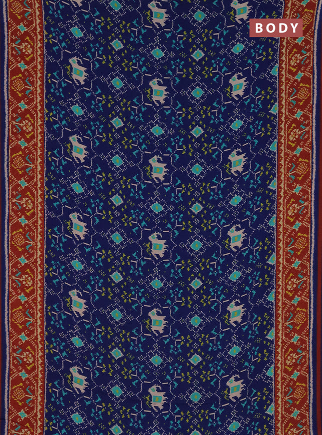 Semi crepe saree blue and maroon with allover ikat prints and printed border