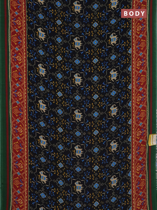 Semi crepe saree black and green with allover ikat prints and printed border