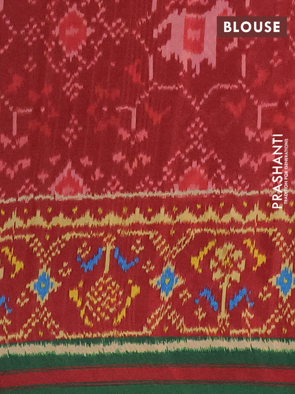 Semi crepe saree black and green with allover ikat prints and printed border