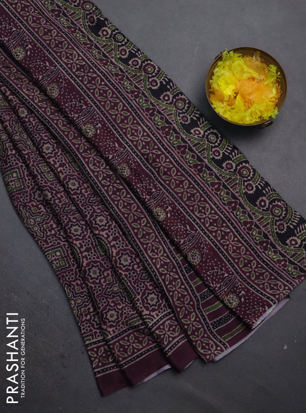 Semi crepe saree wine shade with allover ajrakh prints and printed border