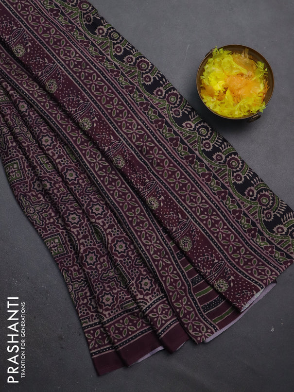 Semi crepe saree wine shade with allover ajrakh prints and printed border
