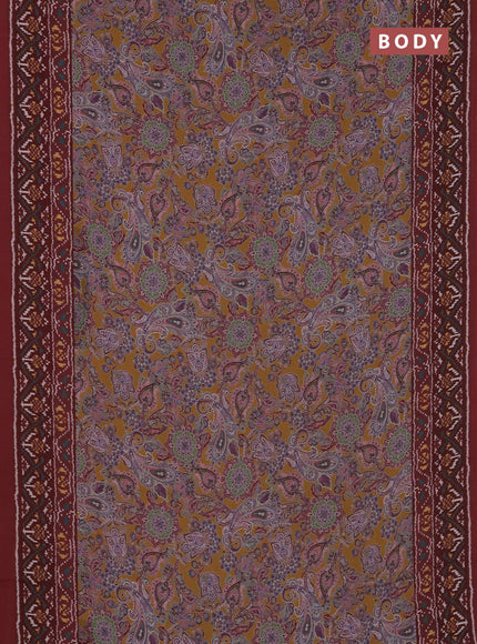 Semi crepe saree mustard yellow and maroon with allover prints and printed border