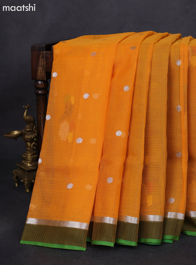 Pure zari kota silk saree mustard yellow and green with silver zari woven buttas and silver zari woven simple border