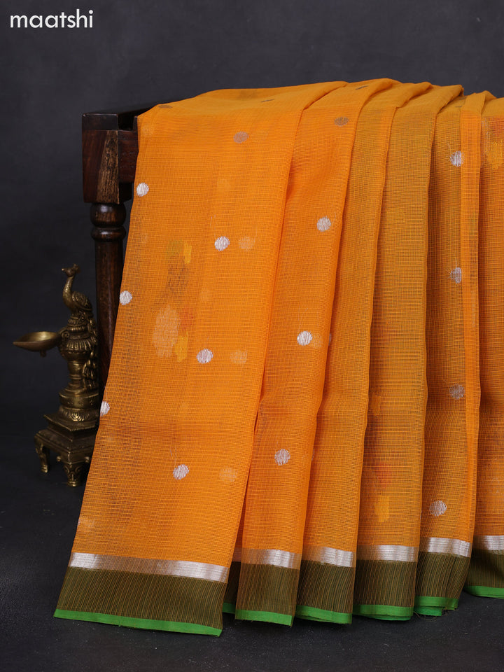 Pure zari kota silk saree mustard yellow and green with silver zari woven buttas and silver zari woven simple border