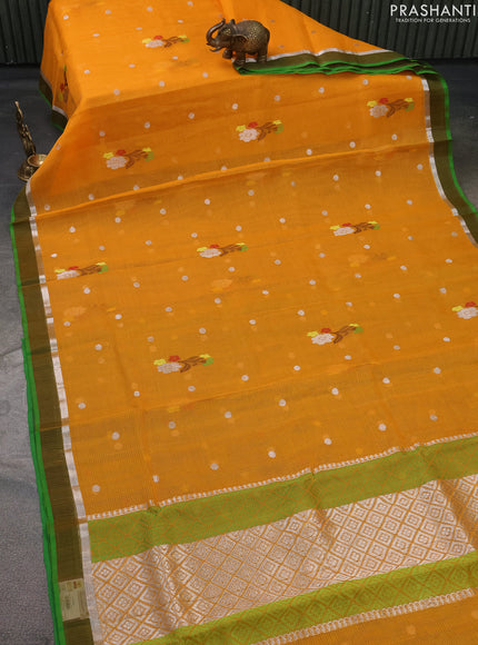 Pure zari kota silk saree mustard yellow and green with silver zari woven buttas and silver zari woven simple border