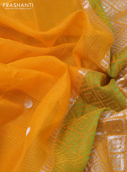 Pure zari kota silk saree mustard yellow and green with silver zari woven buttas and silver zari woven simple border