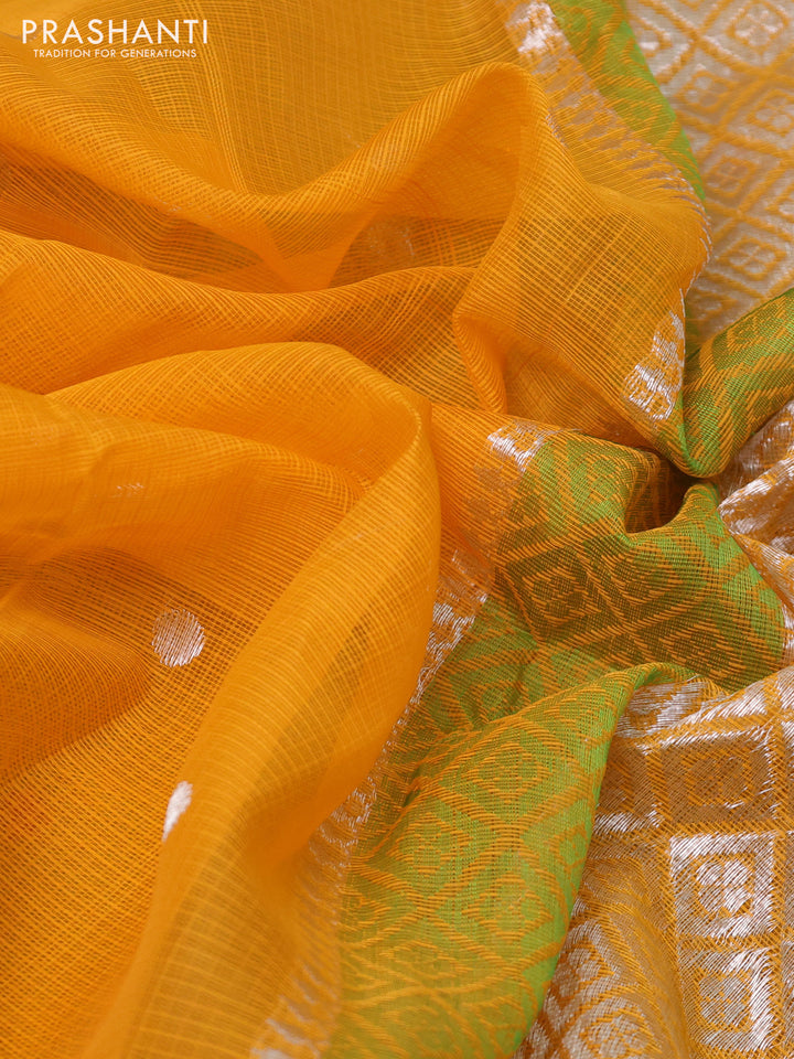 Pure zari kota silk saree mustard yellow and green with silver zari woven buttas and silver zari woven simple border