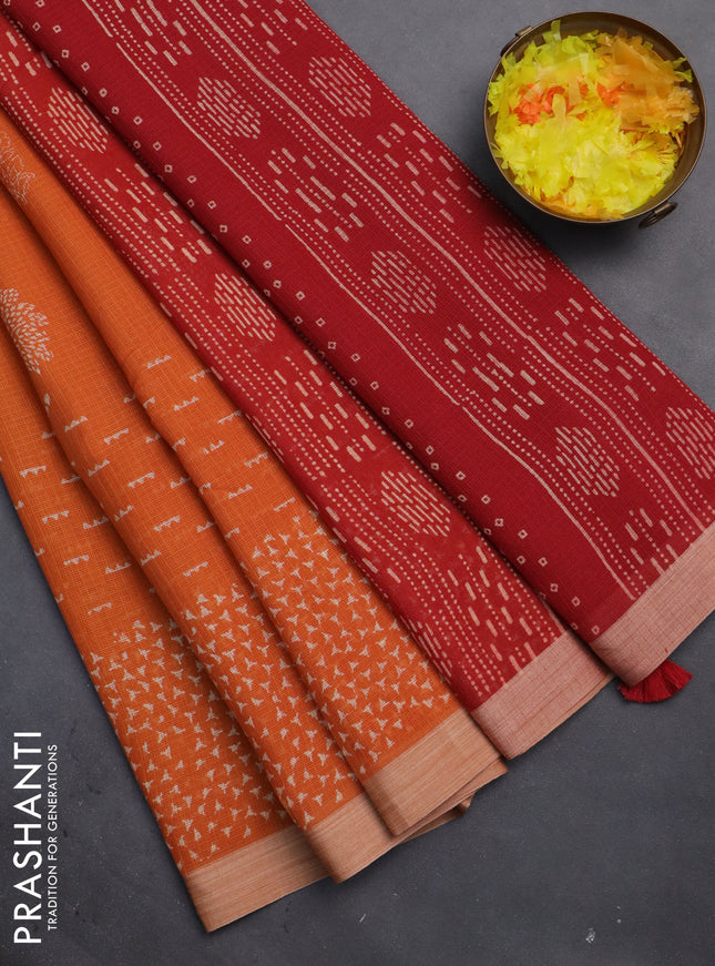 Kota silk cotton saree orange and red with allover block prints and simple border