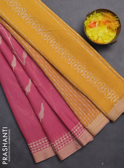 Kota silk cotton saree light pink and yellow with allover block prints and simple border