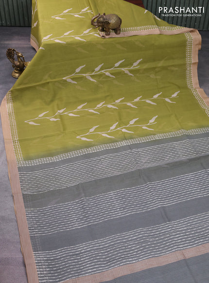 Kota silk cotton saree light green and grey with allover block prints and simple border