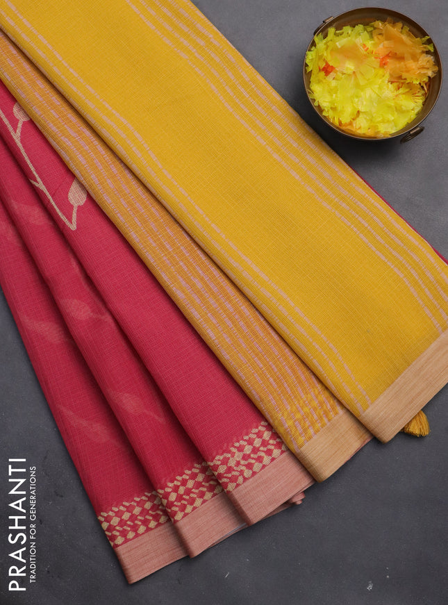 Kota silk cotton saree pink and yellow with allover block prints and simple border