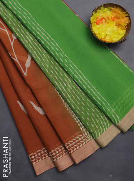 Kota silk cotton saree rust shade and green with allover block prints and simple border