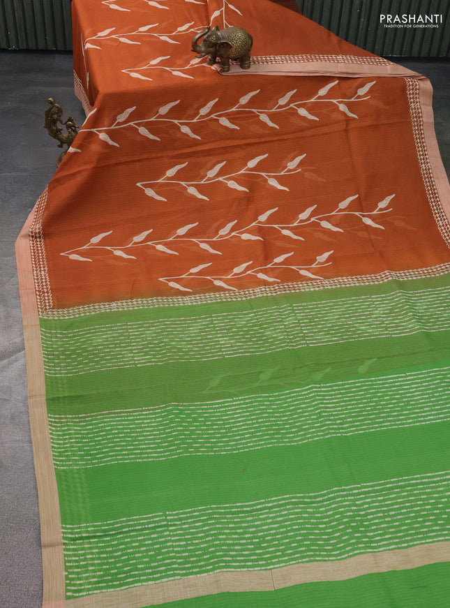 Kota silk cotton saree rust shade and green with allover block prints and simple border