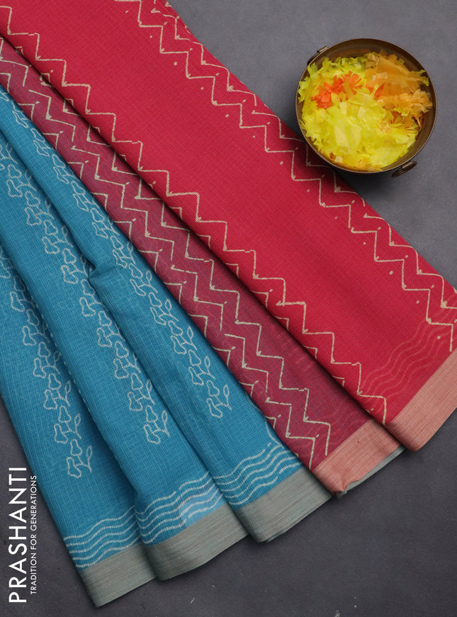 Kota silk cotton saree light blue and peach pink shade with allover block prints and simple border