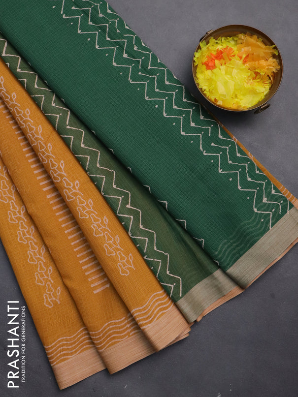 Kota silk cotton saree mustard yellow and green with allover block prints and simple border