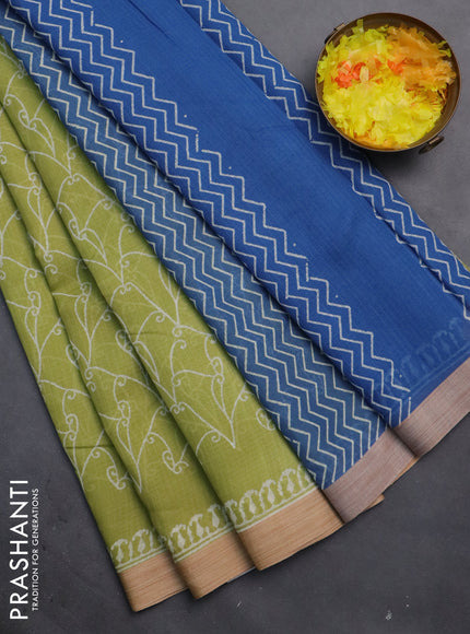 Kota silk cotton saree light green and blue with allover block prints and simple border