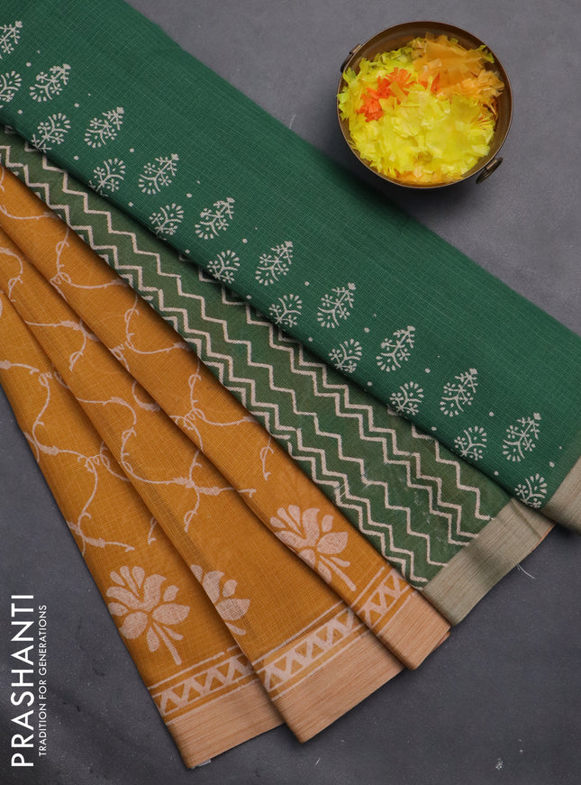 Kota silk cotton saree mustard yellow and green with allover block prints and simple border