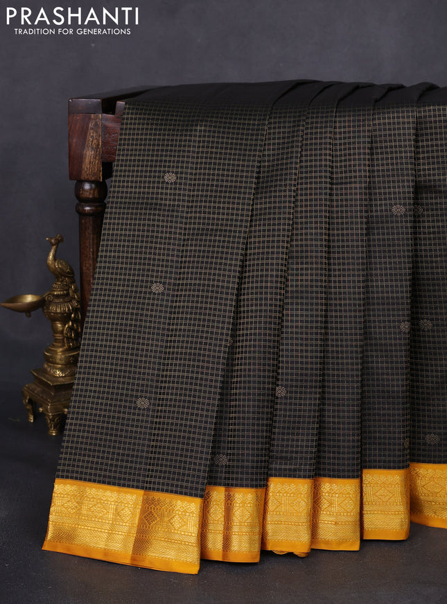 Pure kanchipuram silk saree black and mustard yellow with allover small zari checks & buttas and zari woven korvai border
