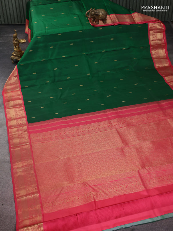 Pure kanchipuram silk saree green and peach pink with zari woven buttas and zari woven korvai border