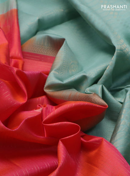 Pure soft silk saree dual shade of pinkish orange and pastel blue with allover zari weaves and zari woven simple border