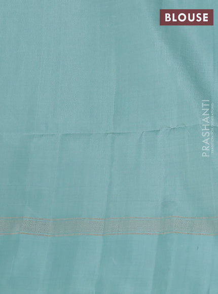 Pure soft silk saree dual shade of pinkish orange and pastel blue with allover zari weaves and zari woven simple border