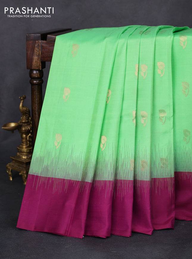 Pure soft silk saree light green and dark magenta pink with zari woven buttas and simple border