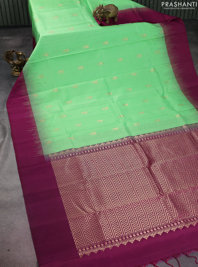 Pure soft silk saree light green and dark magenta pink with zari woven buttas and simple border