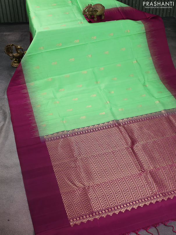 Pure soft silk saree light green and dark magenta pink with zari woven buttas and simple border
