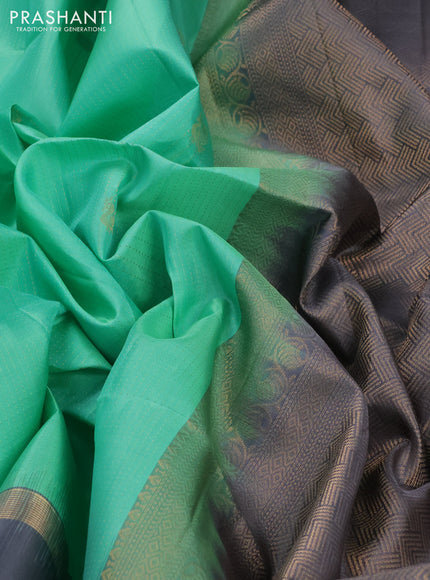 Pure soft silk saree teal green and grey with allover zari weaves and rettapet zari woven border
