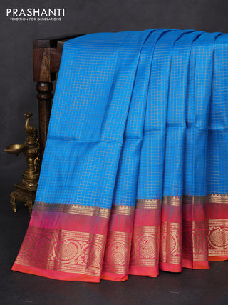 Pure soft silk saree cs blue and dual shade of pinkish orange with allover small zari checked pattern and zari woven border