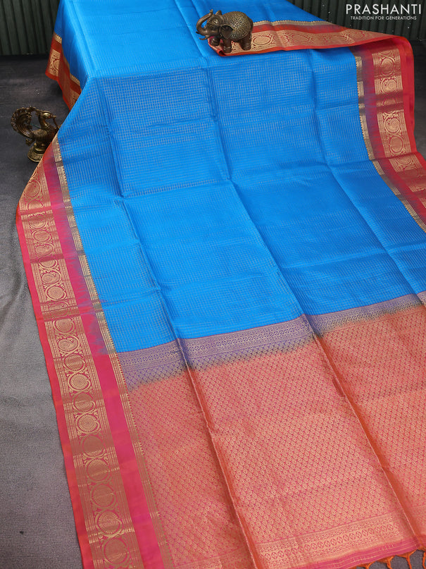 Pure soft silk saree cs blue and dual shade of pinkish orange with allover small zari checked pattern and zari woven border