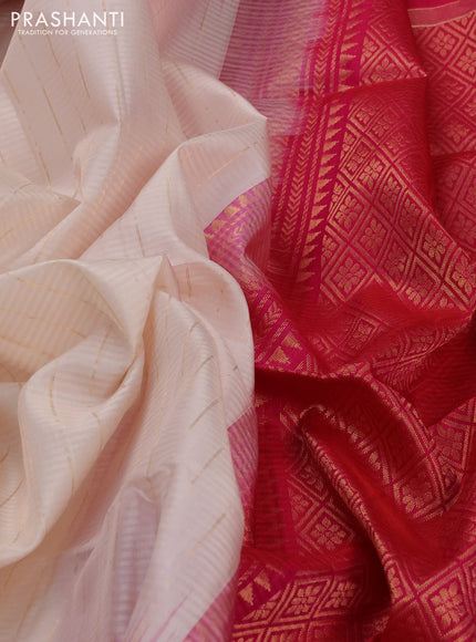 Pure soft silk saree cream and pink with allover zari weaves and zari woven simple border