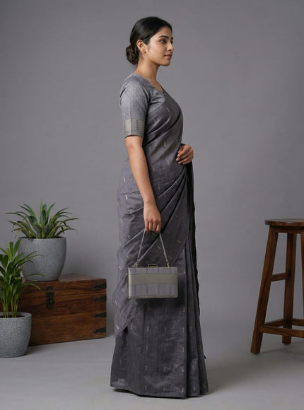 Semi tussar saree grey shade with thread woven buttas & purse