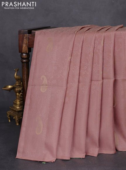 Kanchipuram silk saree pastel peach and pastel green with allover self emboss & zari buttas in borderless style